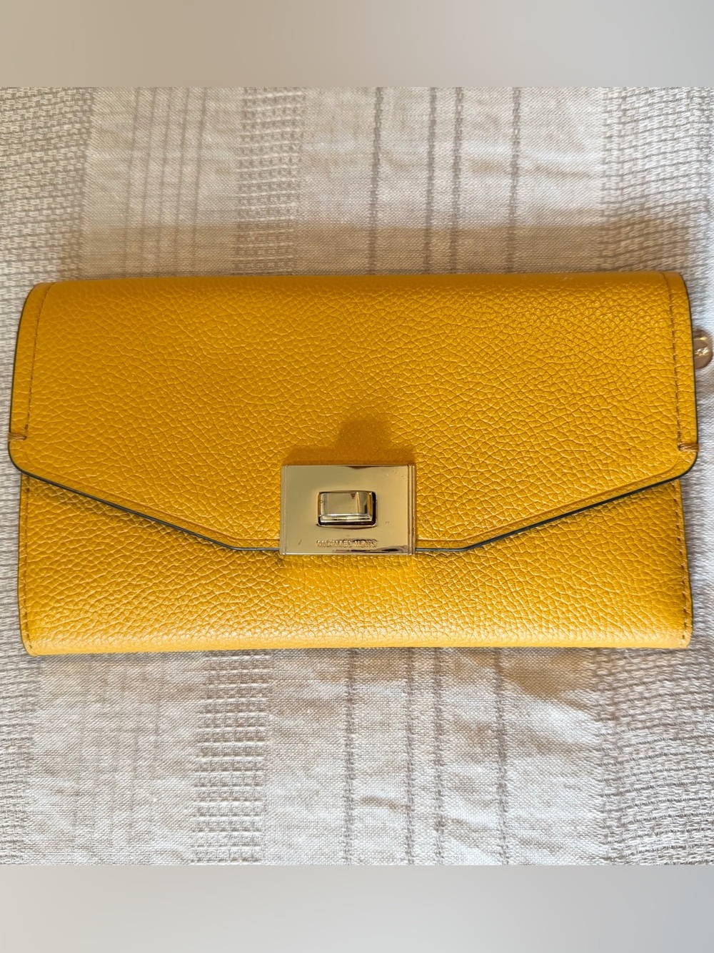 Michael Kors Cassie trifold wallet w/gold-tone hardware & leather in Marigold